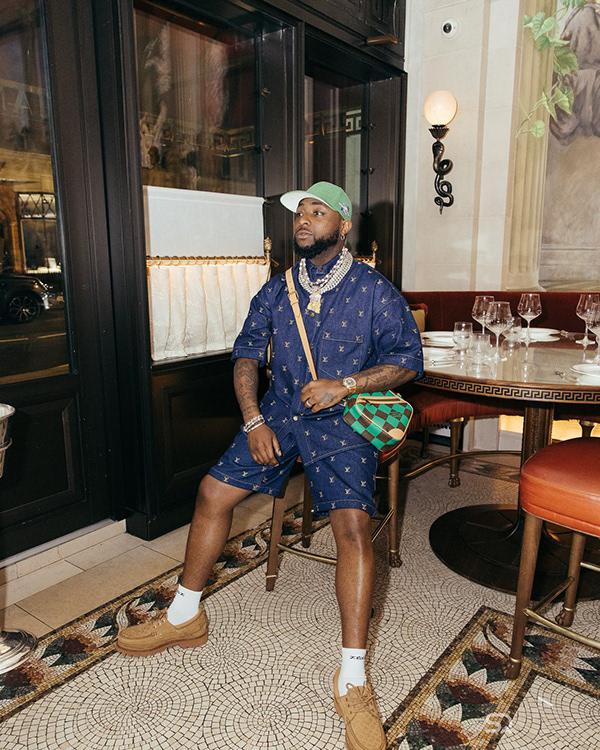 Davido in Navy Monogram Short Set, Green Cap & Crossbody Bag | OutfitLibrary.com