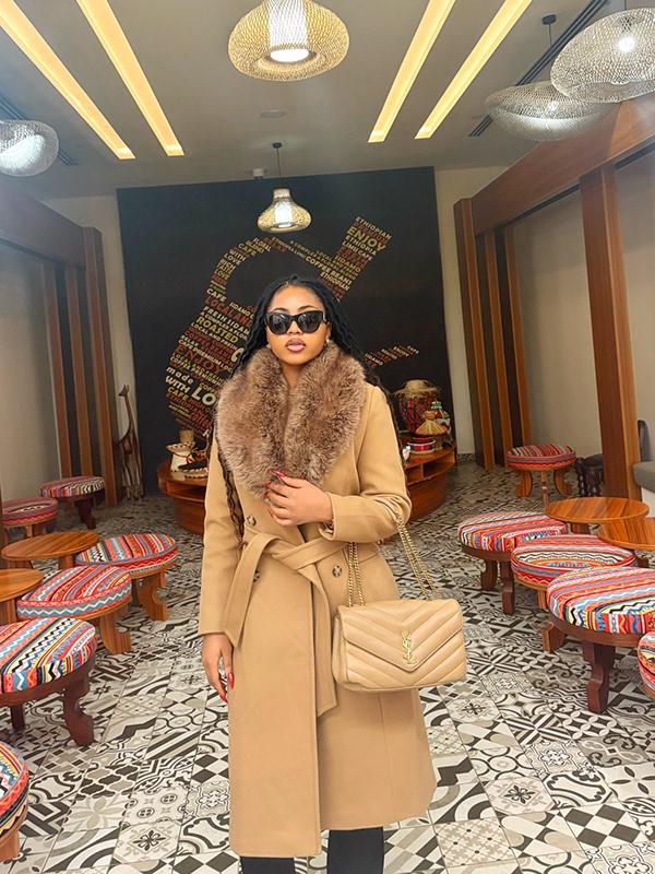 Regina Daniels Brings Luxury in Camel Coat with Fur Collar & YSL Bag | OutfitLibrary.com